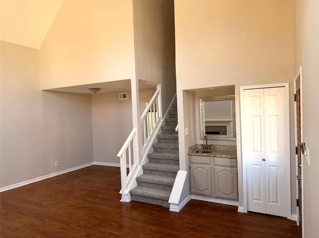 a view of entryway with wooden floor