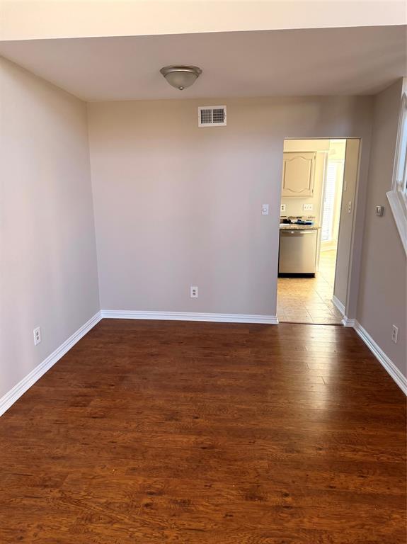 1000 Lamesa Court Irving, TX 75063 - Photo 8 of 28 a view of a room with wooden floor