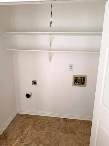 a view of small space with wooden floor