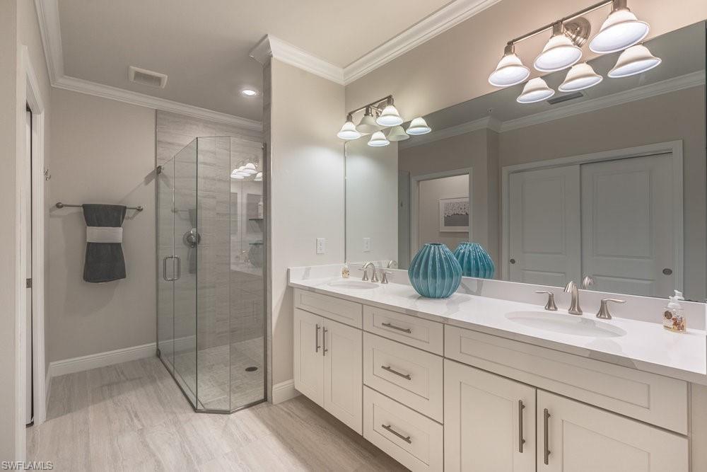 16352 Viansa Way, Unit 102 Naples, FL 34110 - Photo 13 of 30 Primary Bathroom