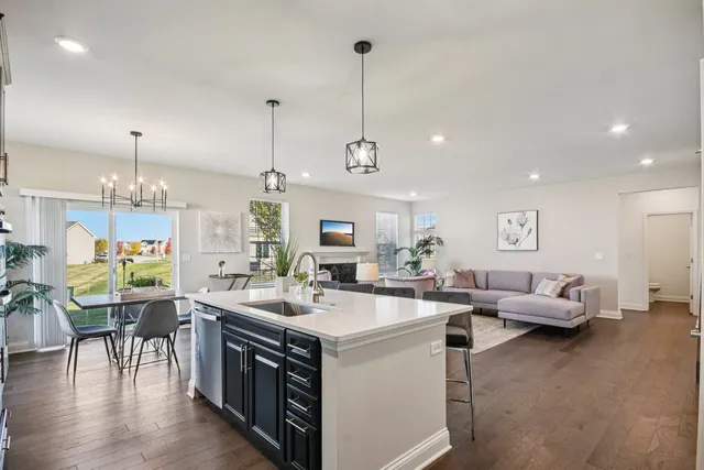 a view of kitchen center island and living room view