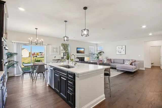 a view of a kitchen and dining room