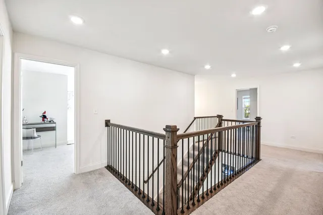 a view of hallway with livingroom