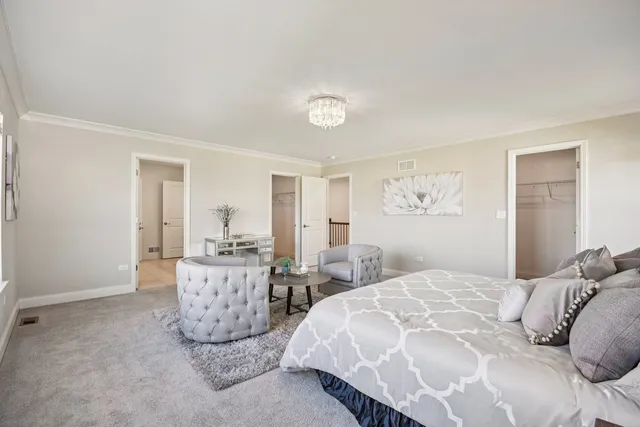 a bedroom with double bed and a window