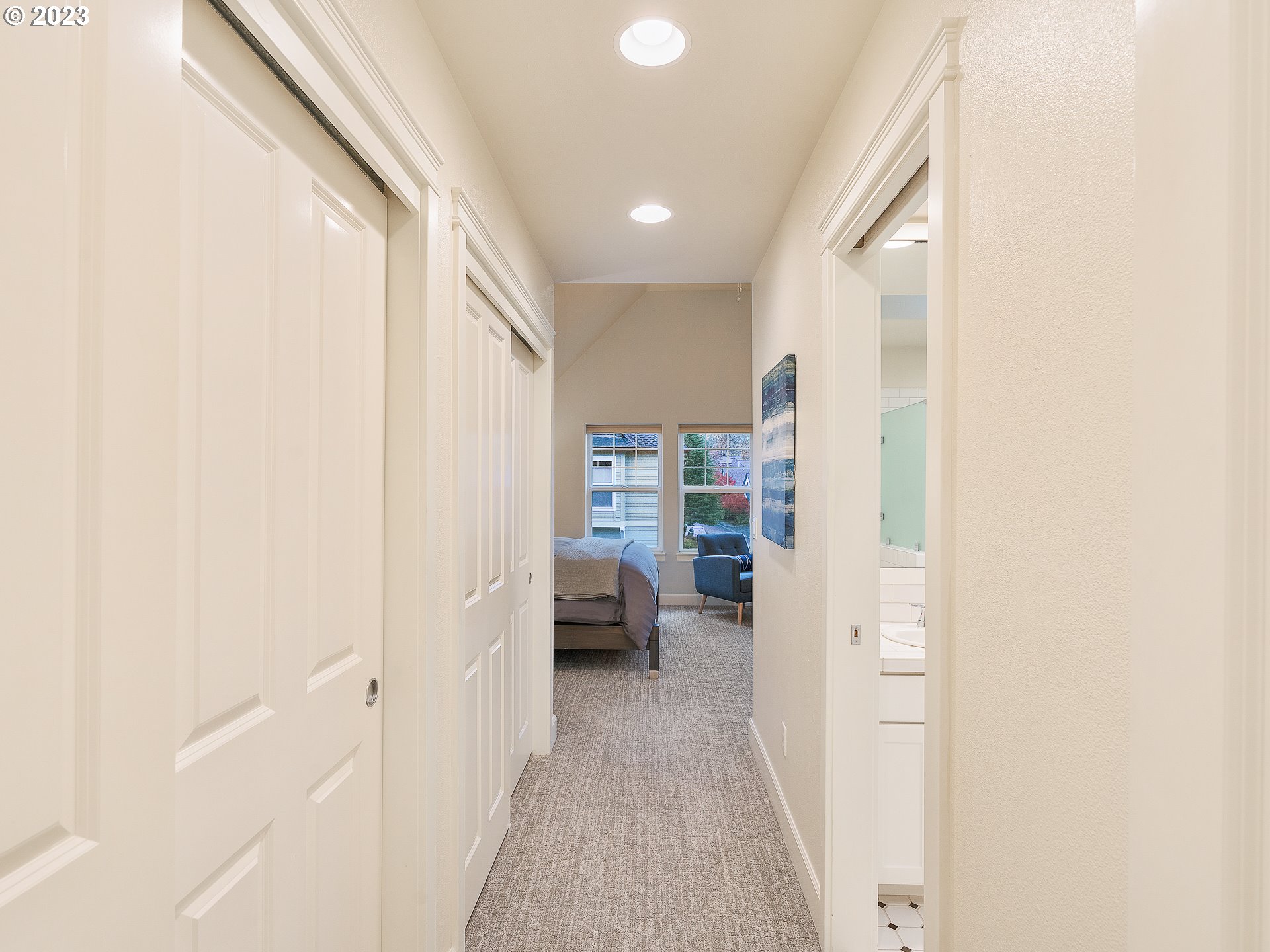 2306 Northwest Miller Road Portland, OR 97229 - Photo 24 of 46 a view of a hallway with furniture and a window