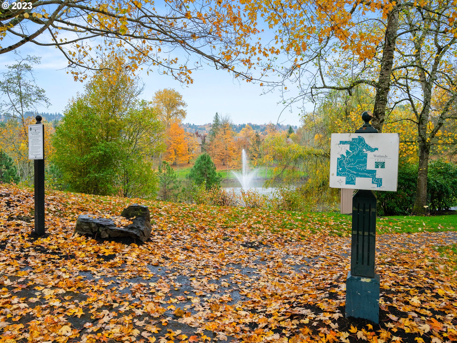 2306 Northwest Miller Road Portland, OR 97229 - Photo 45 of 46 a sign board with a tree in the background