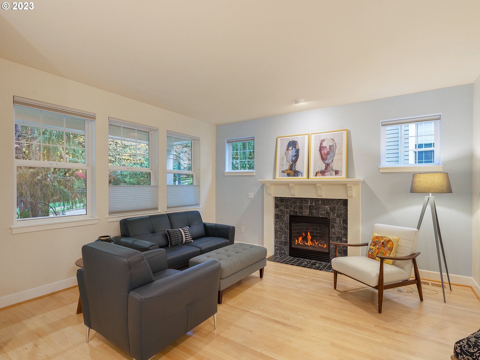 2306 Northwest Miller Road Portland, OR 97229 - Photo 9 of 46 a living room with furniture and a fireplace