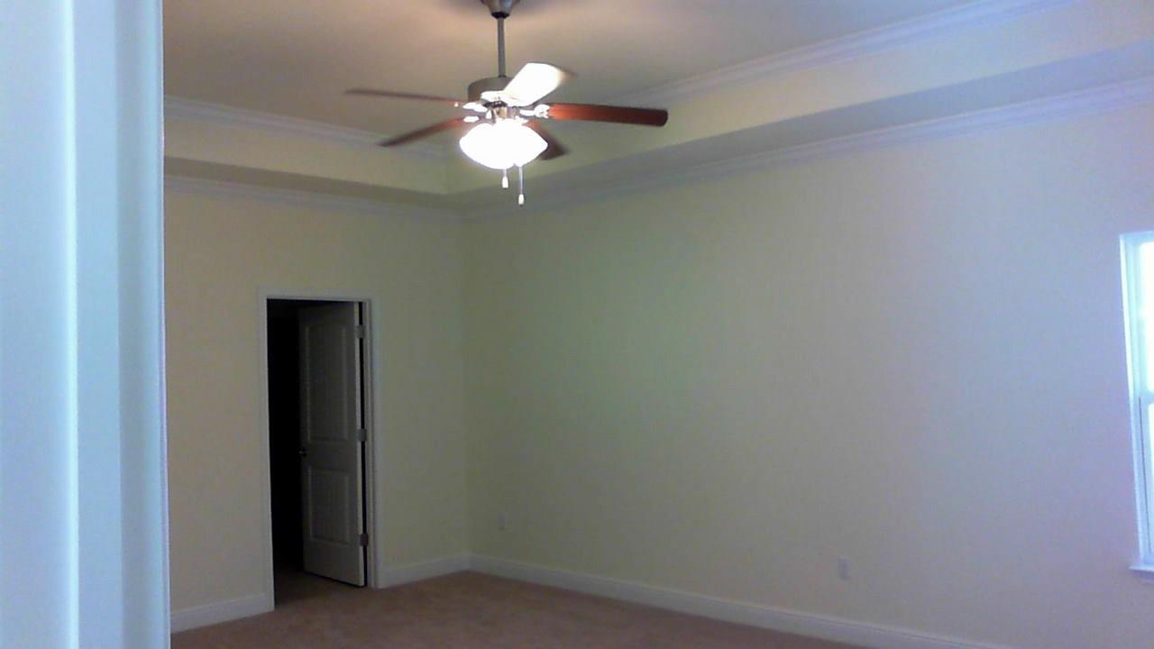 46 Nelly Street Freeport, FL 32439 - Photo 11 of 21 a view of a livingroom with a chandelier fan