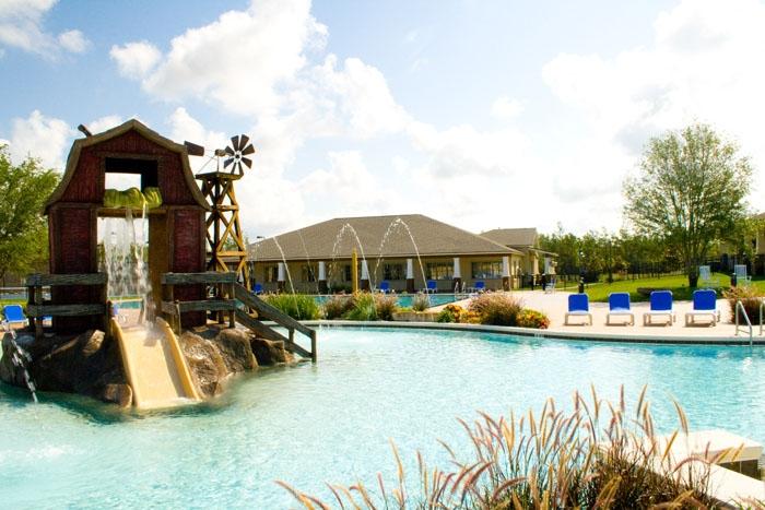 46 Nelly Street Freeport, FL 32439 - Photo 18 of 21 a view of swimming pool with lawn chairs and plants
