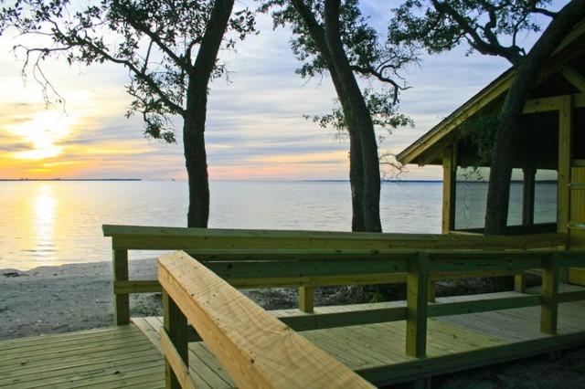 46 Nelly Street Freeport, FL 32439 - Photo 21 of 21 a view of a wooden deck and a backyard