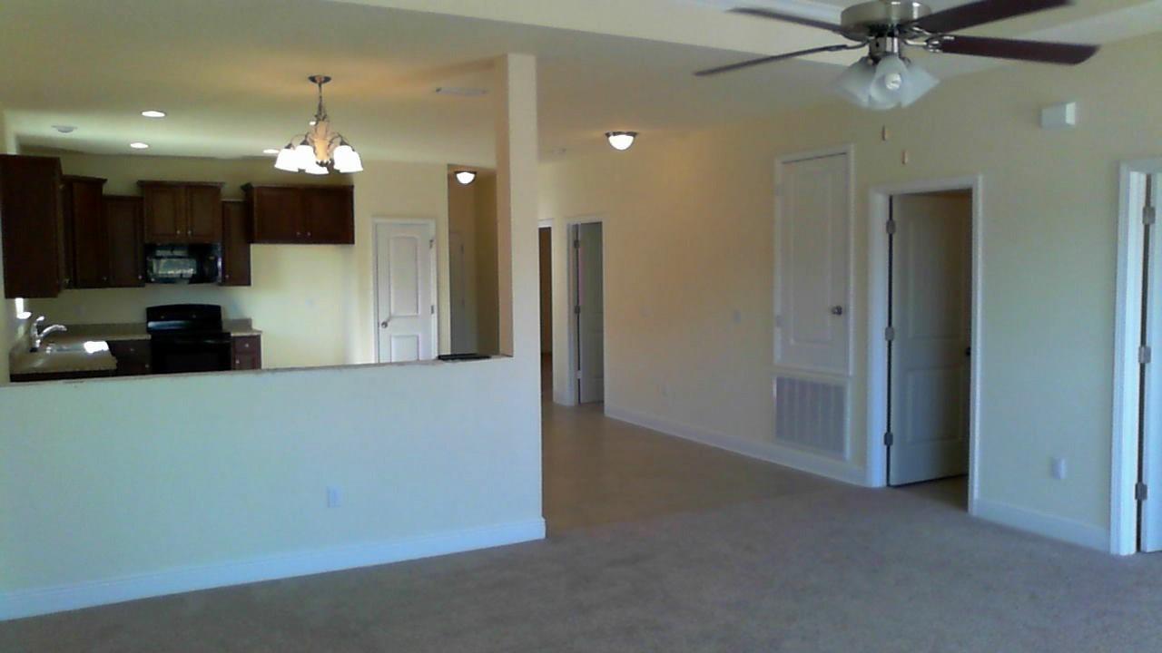 46 Nelly Street Freeport, FL 32439 - Photo 7 of 21 a view of a hallway with a livingroom
