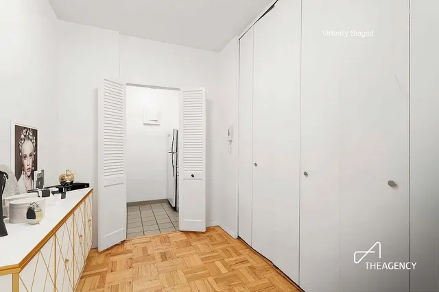 a picture of a park with a bench