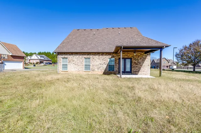 a house with trees in front of it