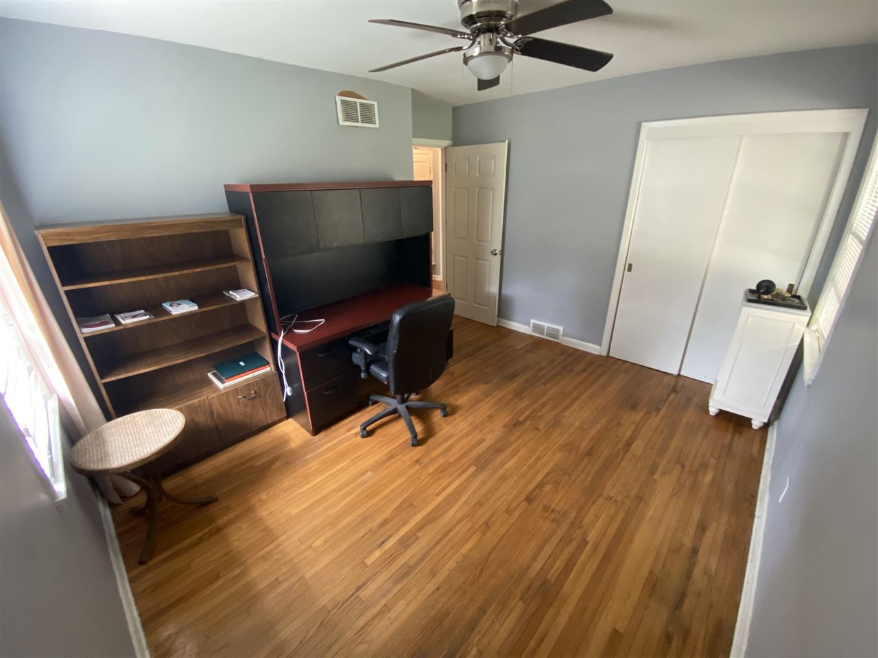 3814 Prescott Road Memphis, TN 38118 - Photo 14 of 22 a room with wooden floor and staircase
