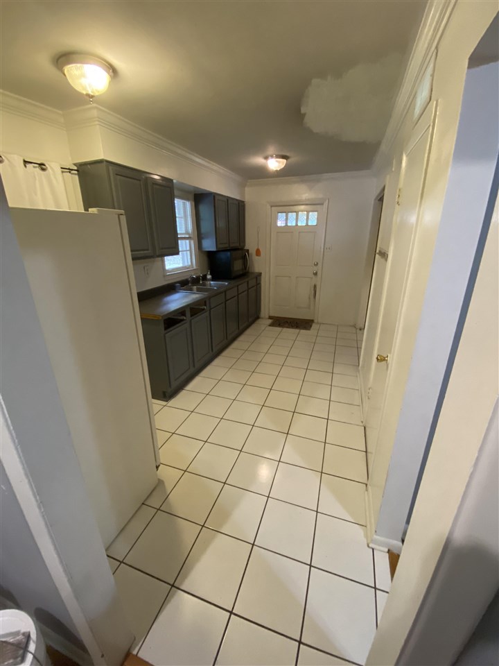 3814 Prescott Road Memphis, TN 38118 - Photo 15 of 22 a view of a kitchen with furniture and wooden floor