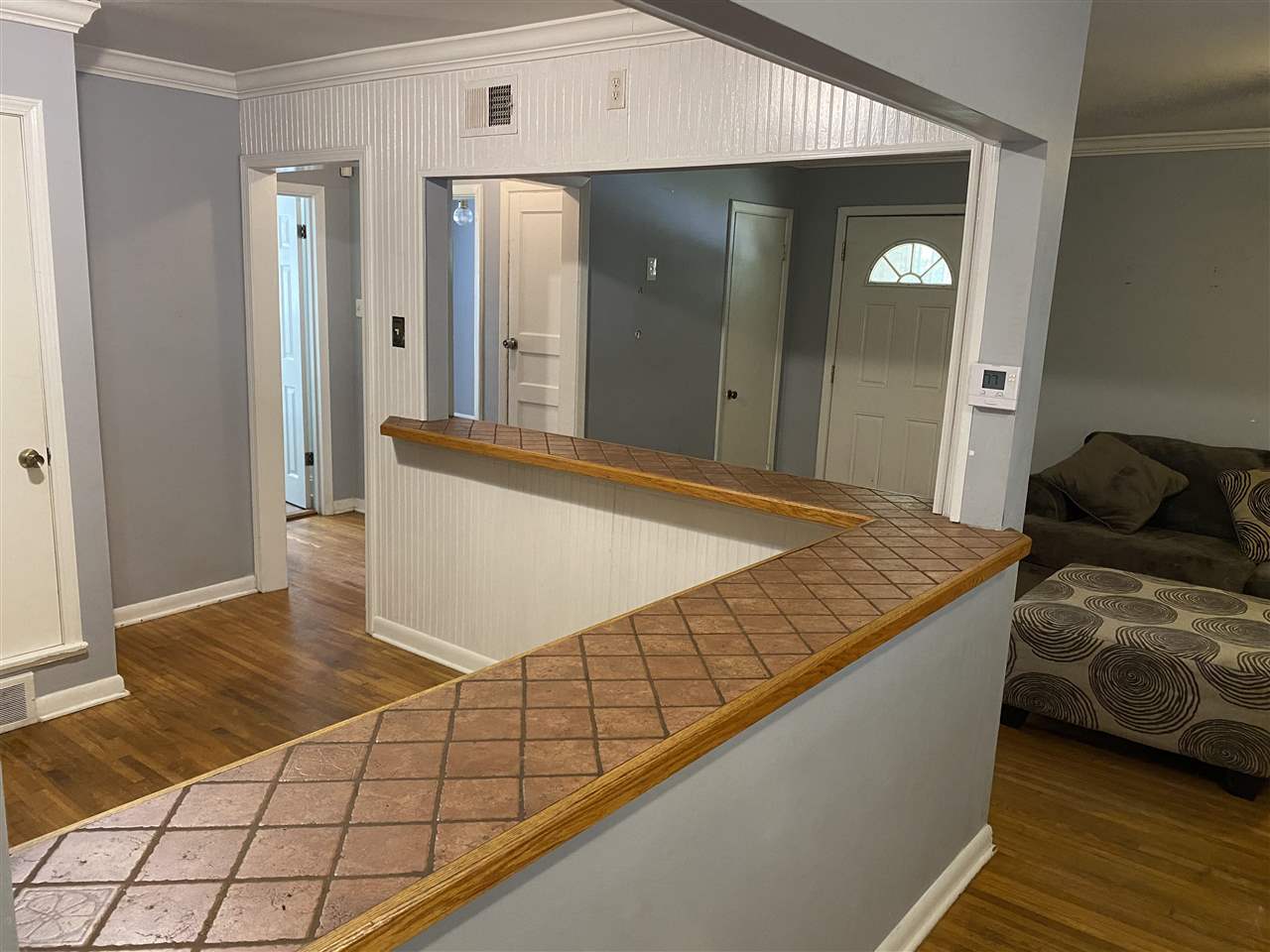 3814 Prescott Road Memphis, TN 38118 - Photo 7 of 22 a bedroom with a bed and a walk in closet