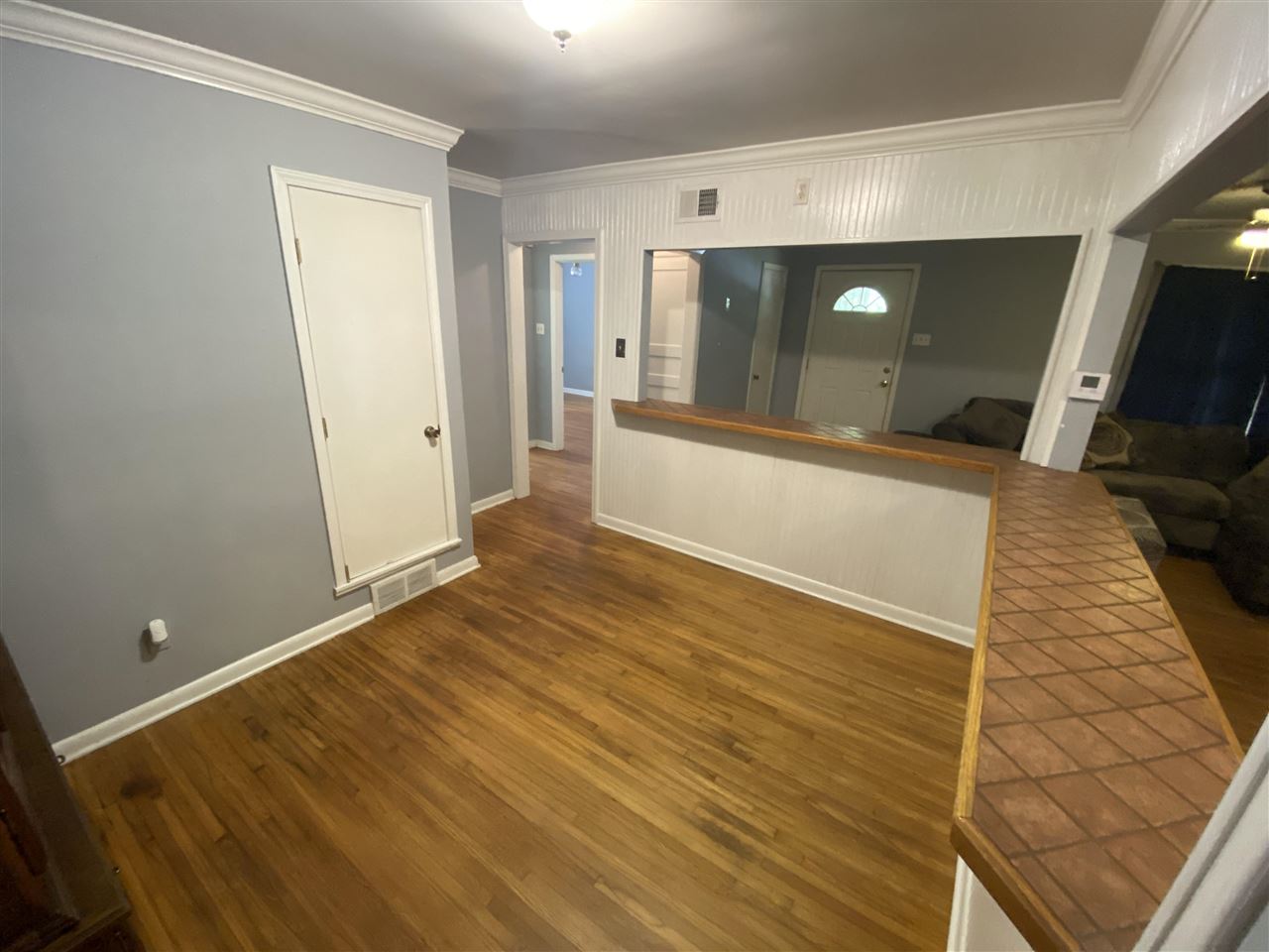 3814 Prescott Road Memphis, TN 38118 - Photo 8 of 22 a view of a livingroom with wooden floor and staircase