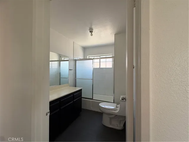 a kitchen with a stove and a microwave