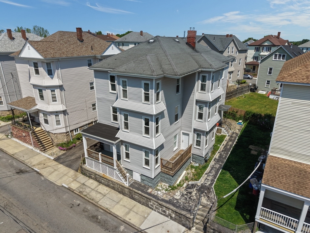 196 Irving Street Fall River, MA 02723 - Photo 3 of 34 an aerial view of a house