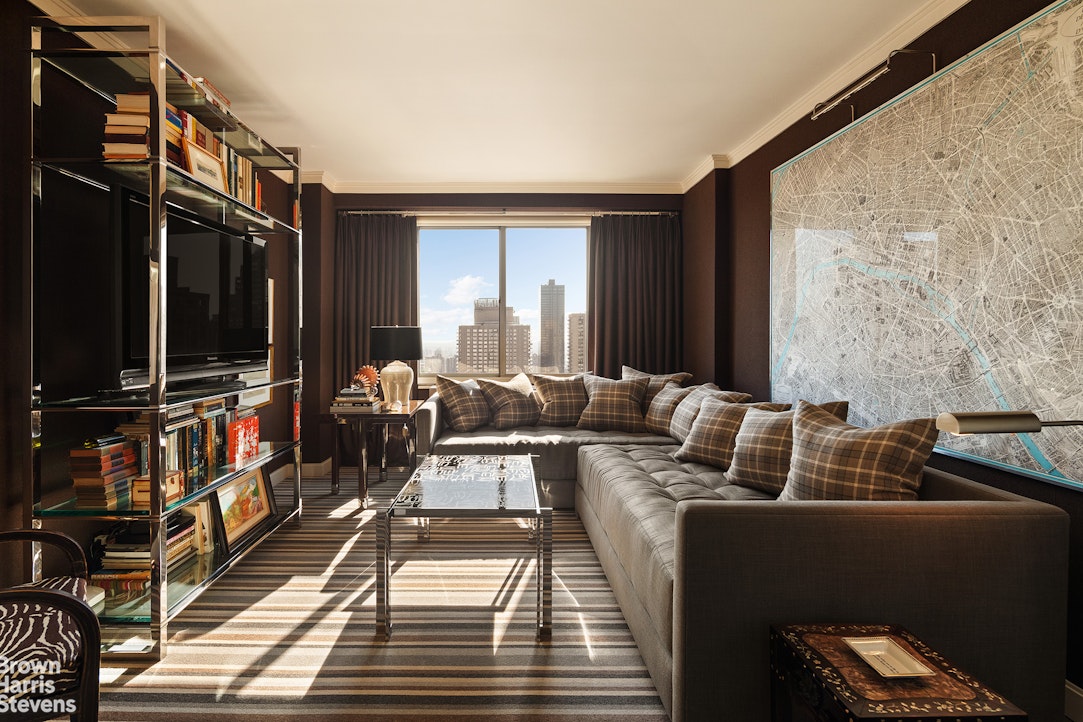 300 East 74th Street, Unit 30AB Manhattan, NY 10021 - Photo 5 of 17 a living room with furniture