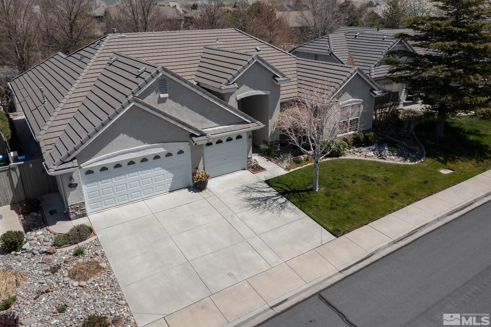 9638 Shadowstone Way Reno, NV 89521 - Photo 4 of 40 a view of a backyard