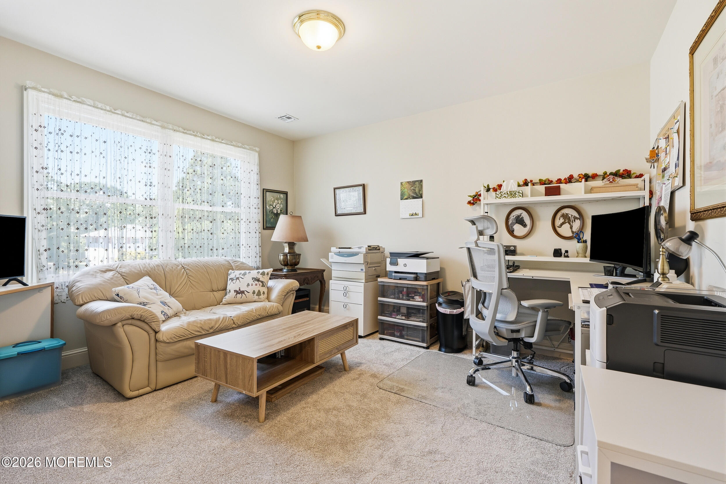 478 Rickey Lane Long Branch, NJ 07740 - Photo 43 of 64 a living room with furniture a flat screen tv and a fireplace