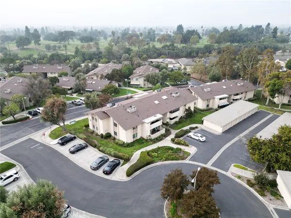 an aerial view of a house with a garden