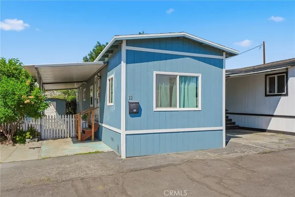 a front view of a house with garage