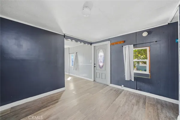 a view of livingroom with hardwood floor and window