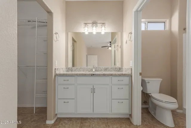a bathroom with a shower and a toilet