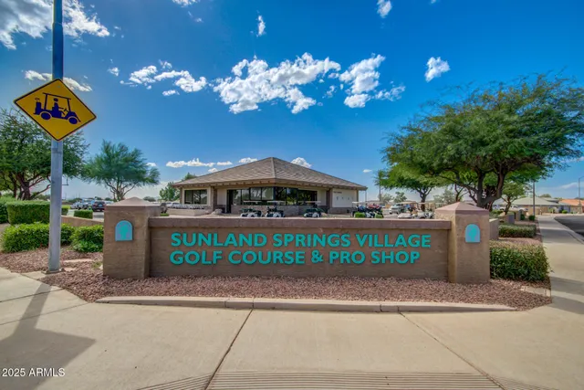 a view of a building with a street