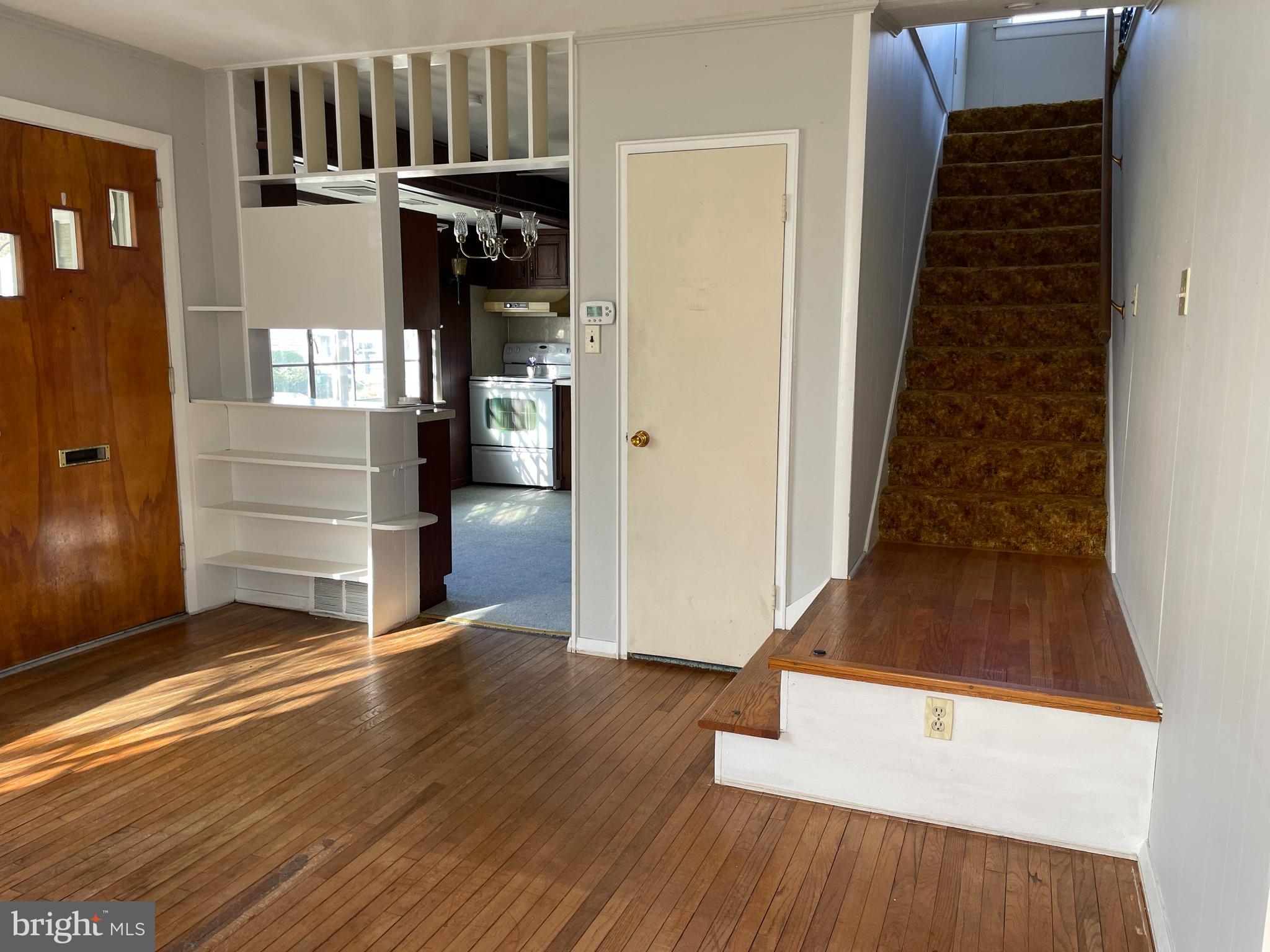 104 Gerald Avenue Reading, PA 19607 - Photo 7 of 42 Looking into kitchen and staircase to upper level