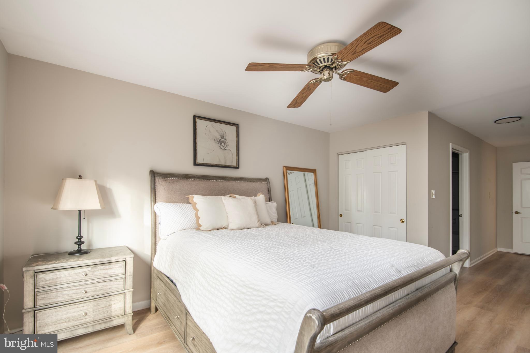 992 Riversedge Circle Annapolis, MD 21401 - Photo 23 of 35 a bedroom with a bed and closet