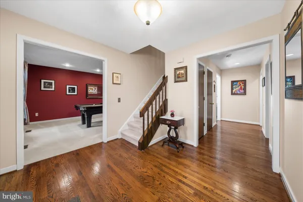 a view of livingroom with furniture and stairs
