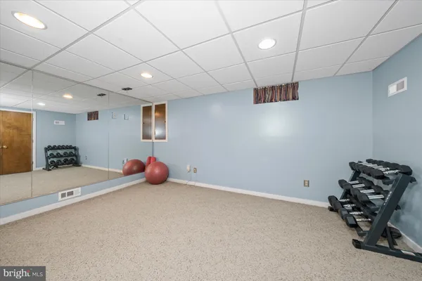 a view of a room with gym equipment