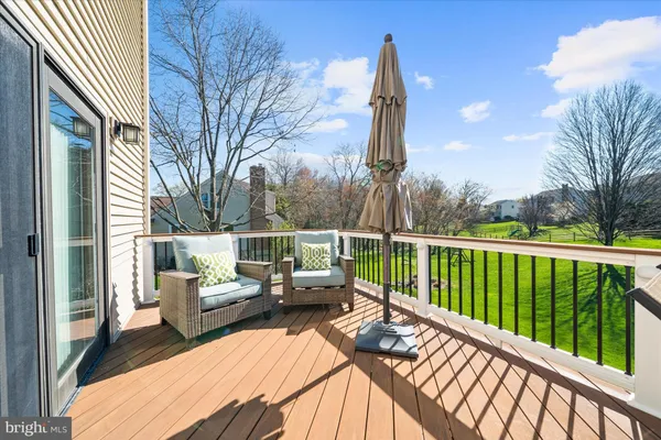 a view of balcony with furniture