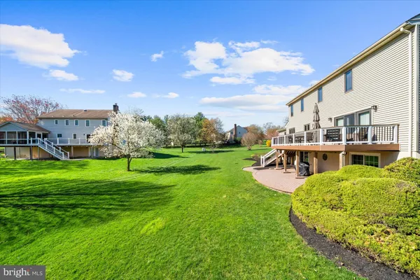 a view of a house with a big yard