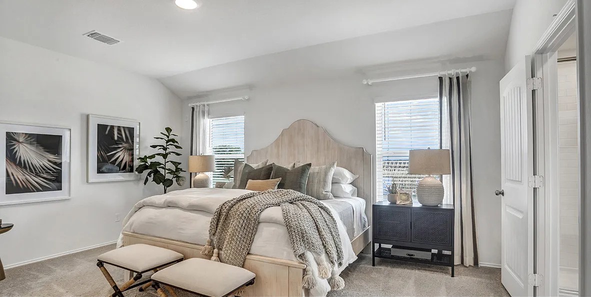 11524 Rush Lane Elgin, TX 78621 - Photo 22 of 29 Bedroom featuring light carpet and lofted ceiling