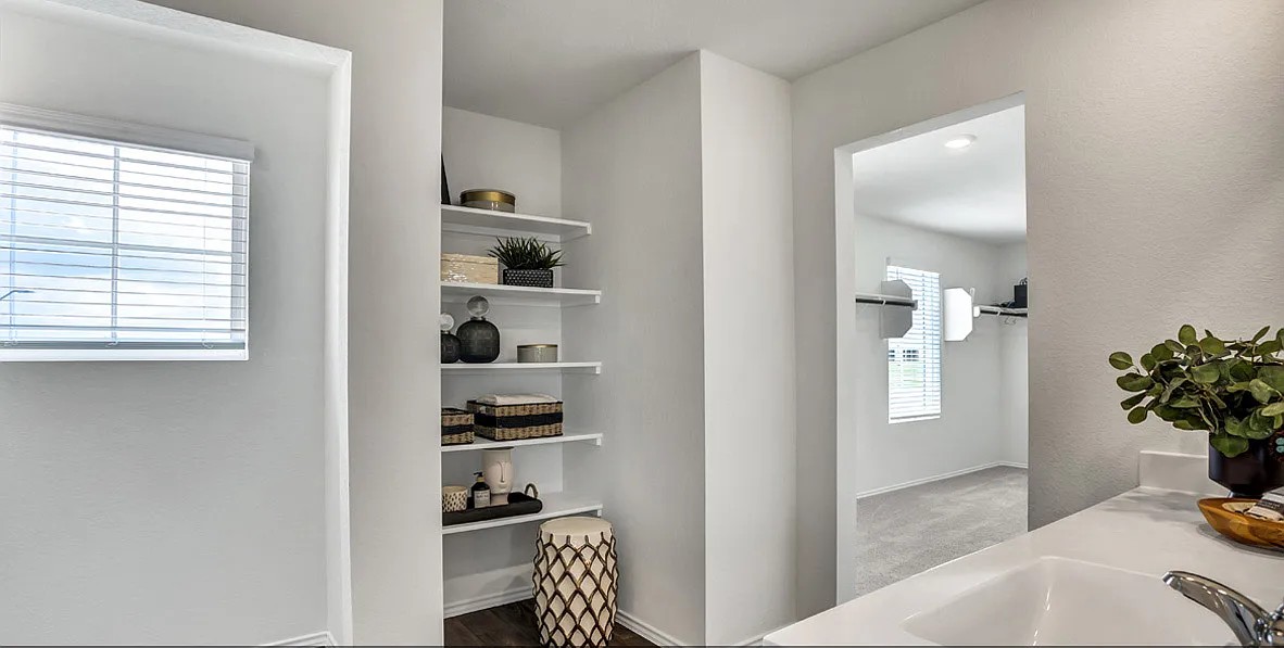 11524 Rush Lane Elgin, TX 78621 - Photo 24 of 29 Full bathroom with vanity, a closet, and dark wood-style floors