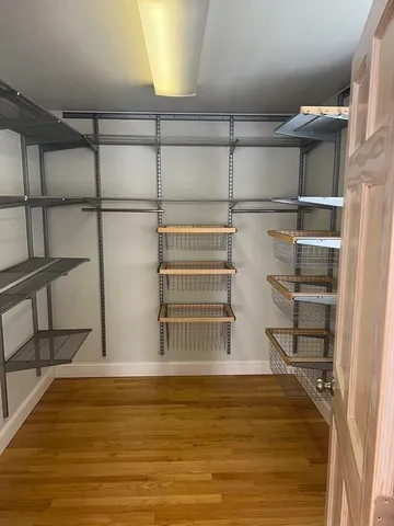 a view of a room with racks on the wall