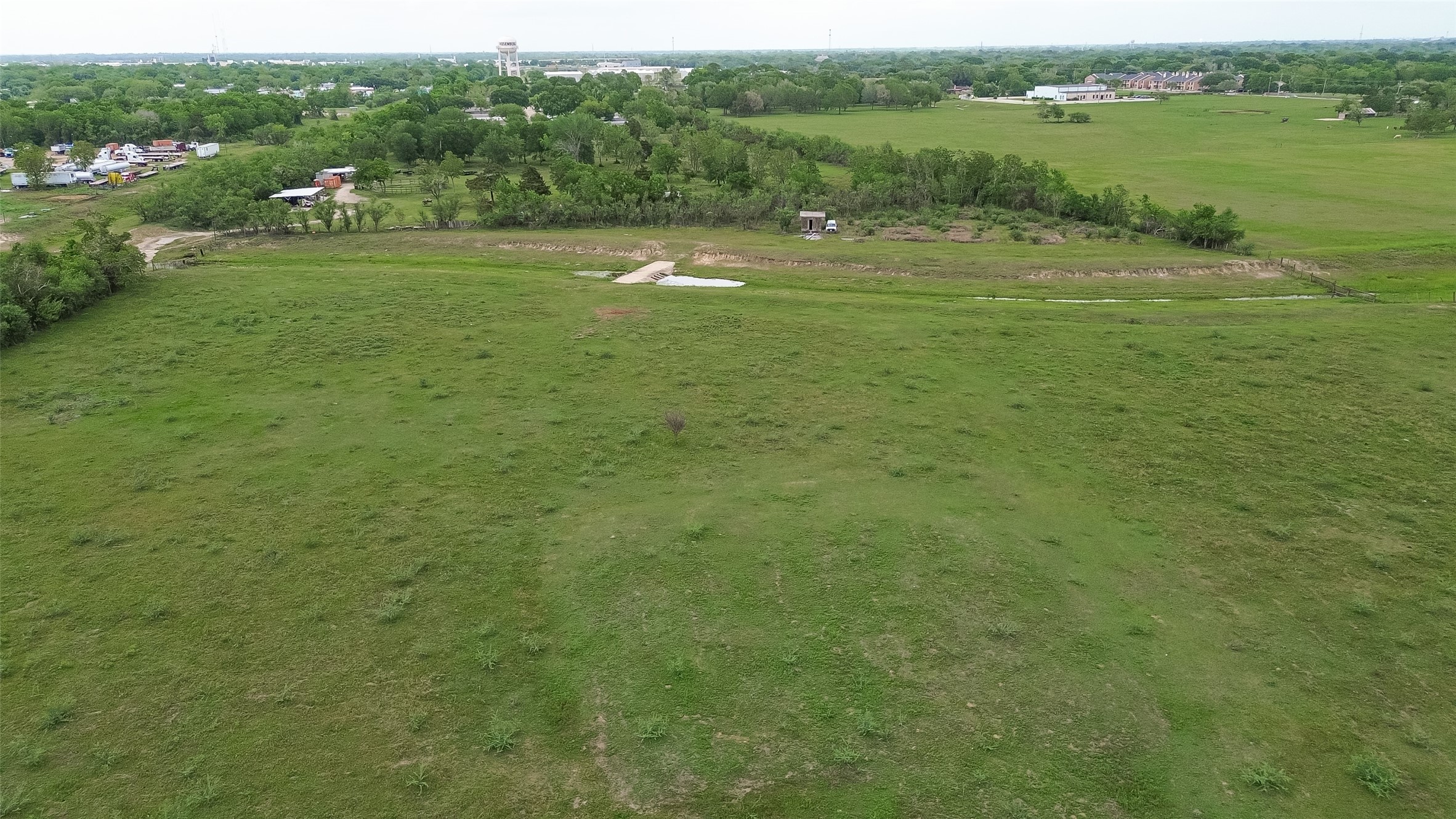 0 Klauke Road Rosenberg, TX 77471 - Photo 6 of 9 a view of a green field with clear sky