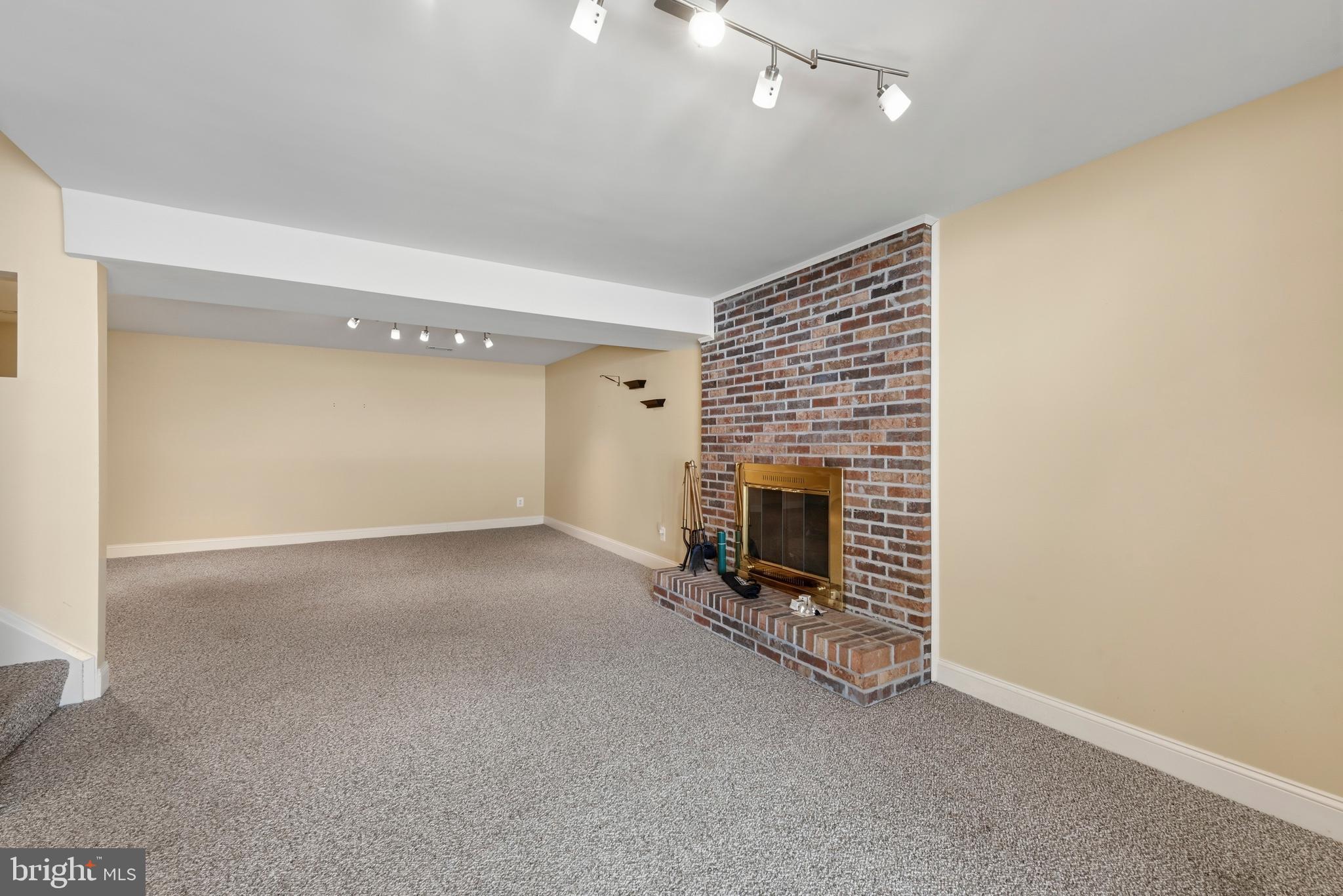 1809 Miller Road Cockeysville, MD 21030 - Photo 22 of 33 Large lower level with cozy fireplace