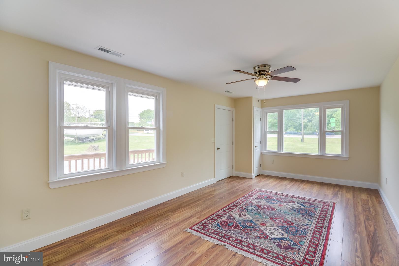 5868 Rock Hall Road Rock Hall, MD 21661 - Photo 3 of 39 Bright and sunny family room