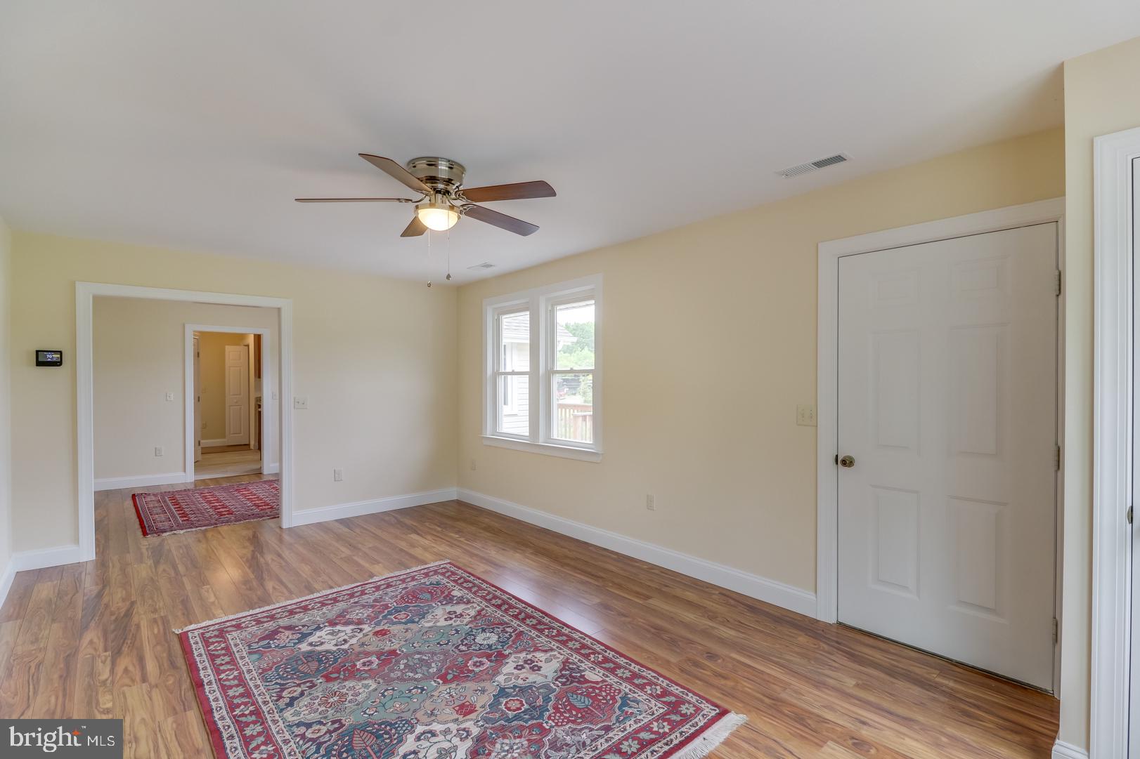 5868 Rock Hall Road Rock Hall, MD 21661 - Photo 4 of 39 Family room opens to dining room