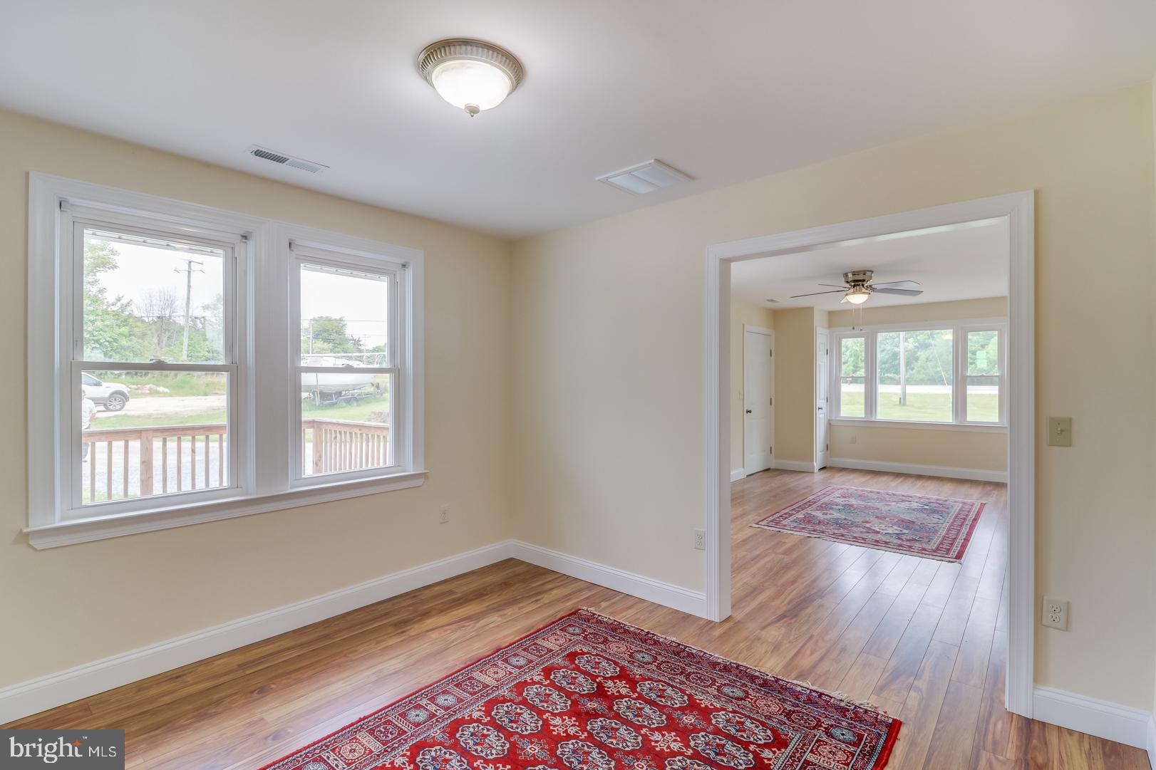 5868 Rock Hall Road Rock Hall, MD 21661 - Photo 5 of 39 Dining room area--new windows and flooring