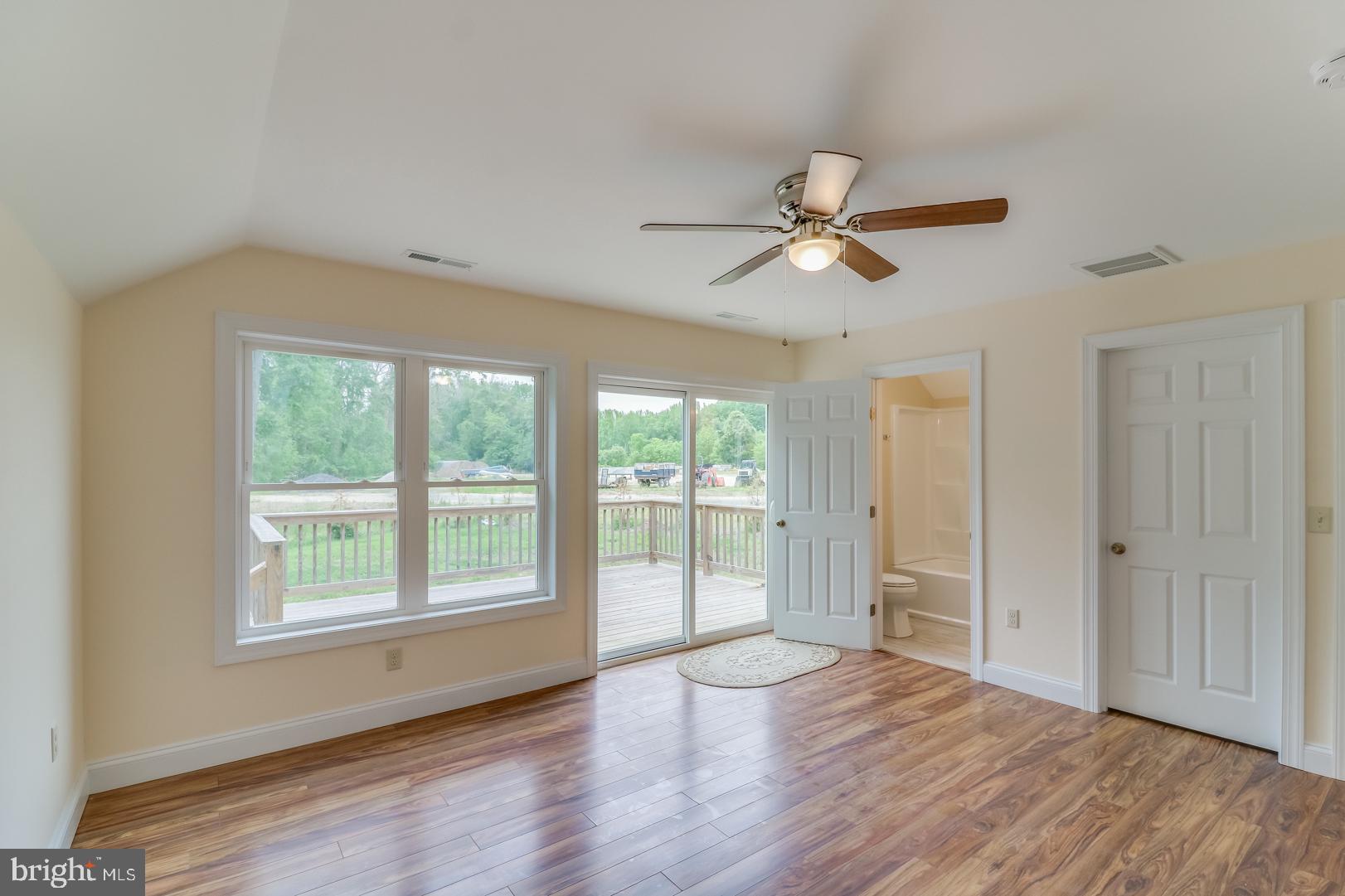 5868 Rock Hall Road Rock Hall, MD 21661 - Photo 10 of 39 Large master bedroom with private deck