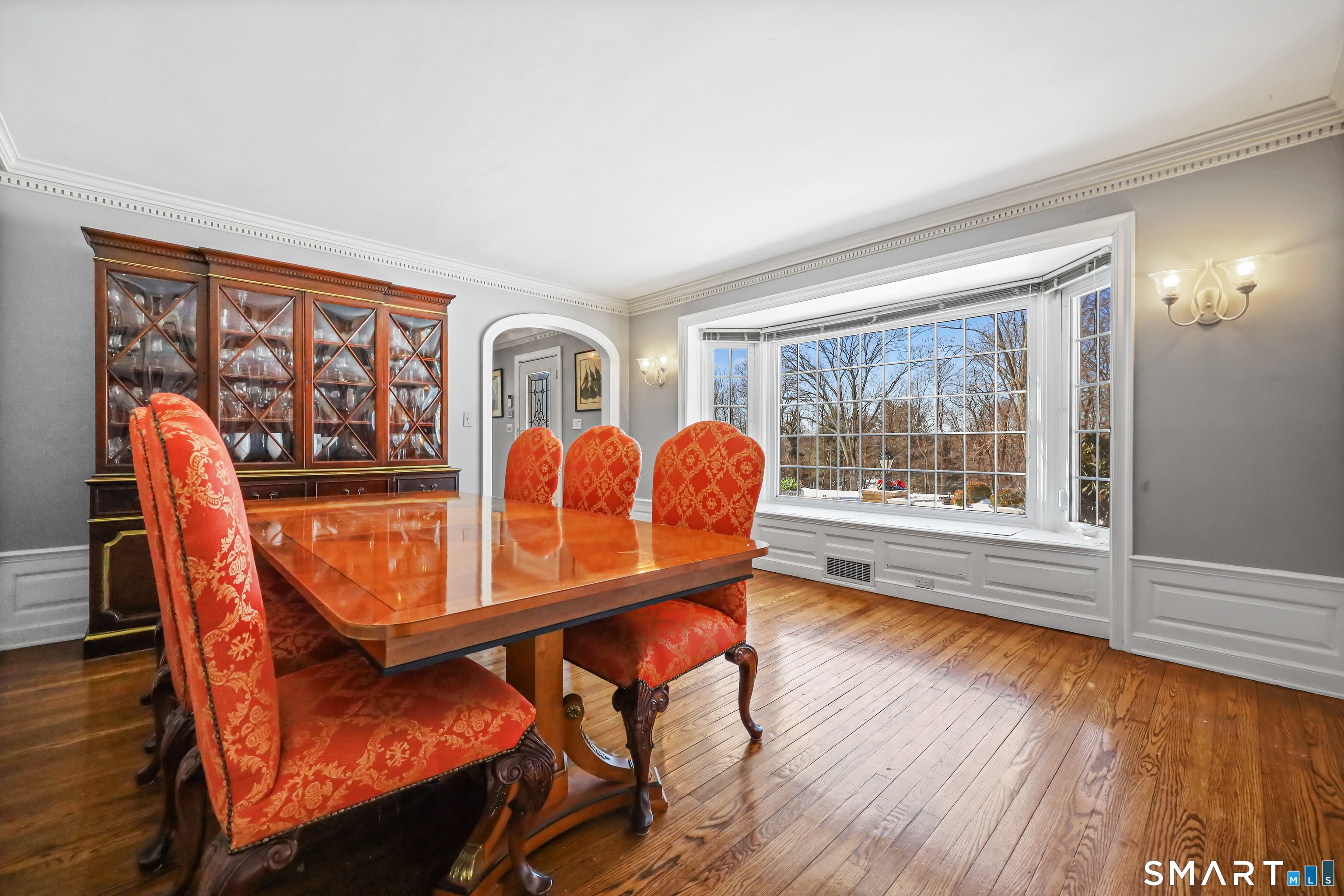 1209 Westover Road Stamford, CT 06902 - Photo 13 of 43 a view of a dining room with furniture window and wooden floor