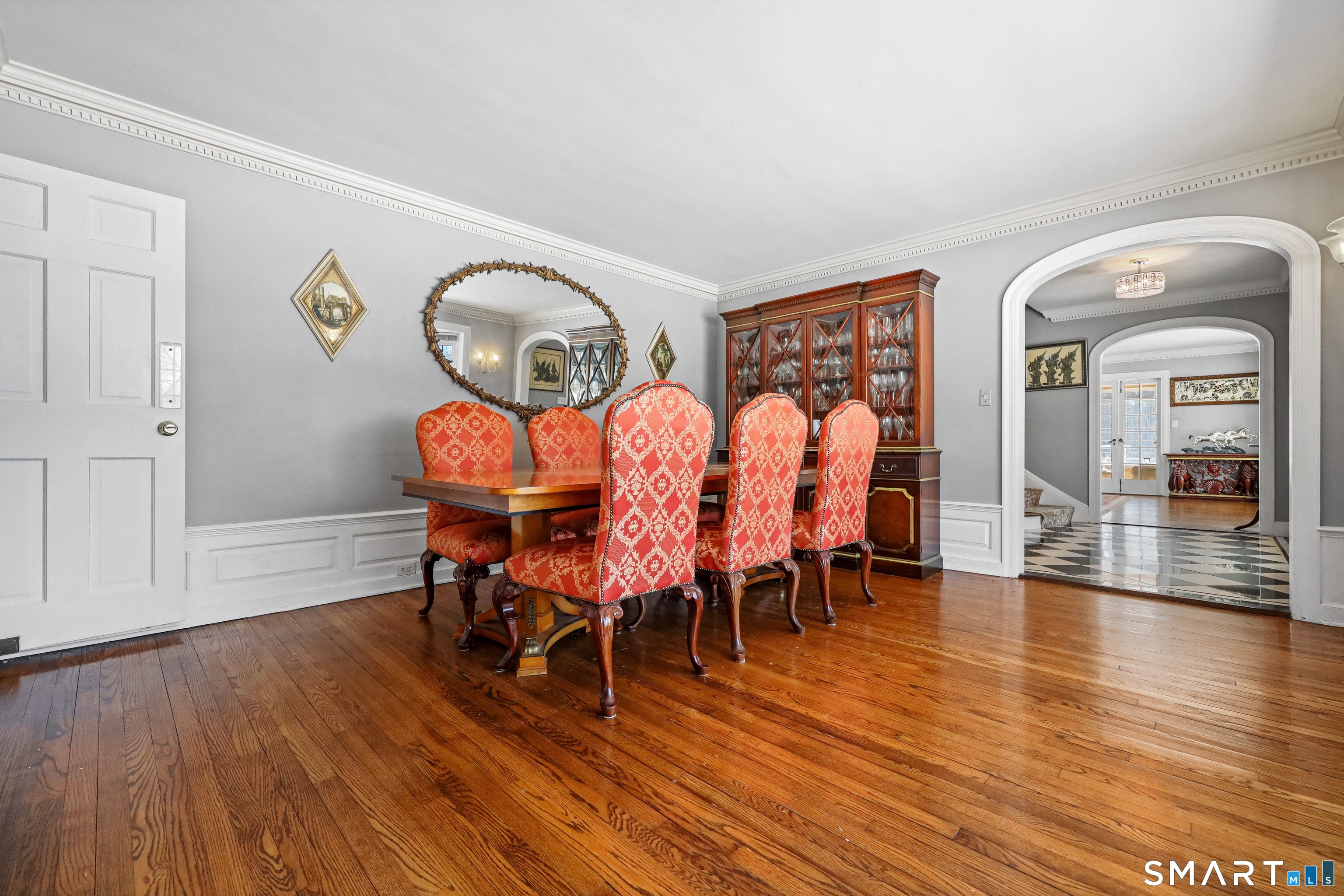 1209 Westover Road Stamford, CT 06902 - Photo 14 of 43 a view of a dining room with furniture and wooden floor