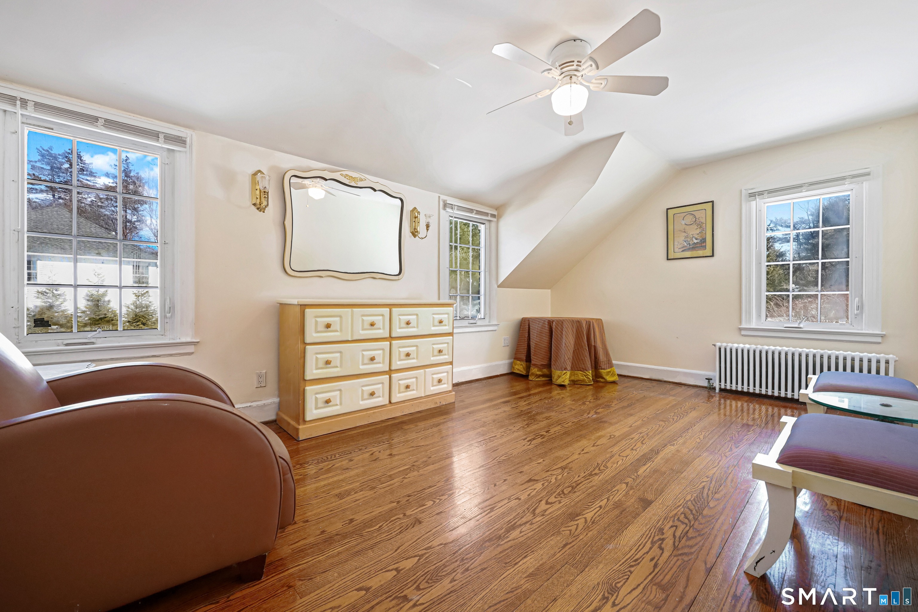 1209 Westover Road Stamford, CT 06902 - Photo 16 of 43 a living room with furniture and wooden floor