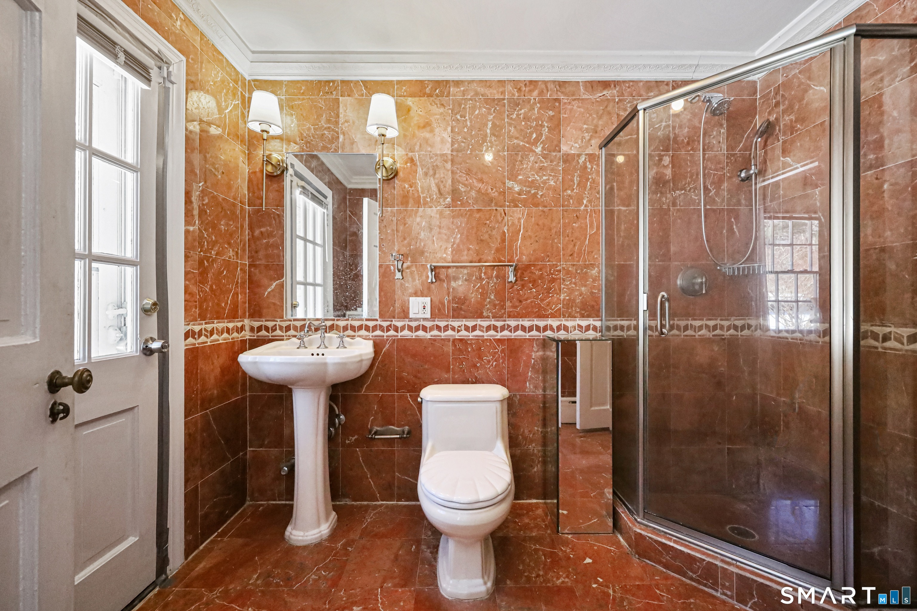 1209 Westover Road Stamford, CT 06902 - Photo 20 of 43 a bathroom with a toilet a sink and a shower